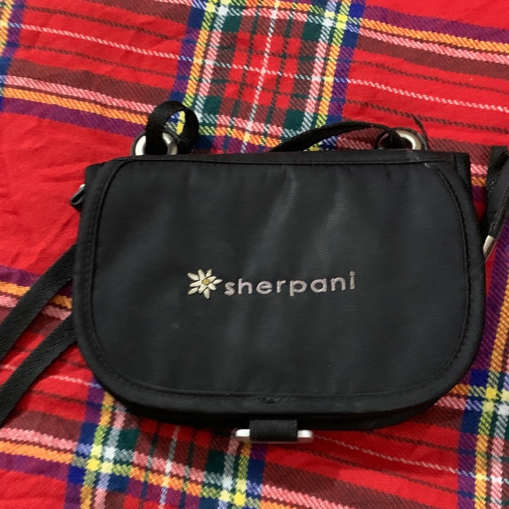 Sherpani Black Crossbody Bag with Floral Accent